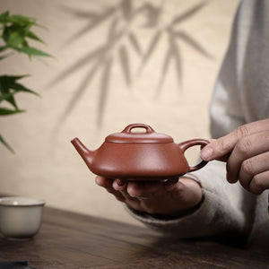 宜興紫砂壺紅降坡泥逸瓢壺130CC手持照片