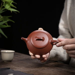 宜興紫砂壺紅降坡泥逸瓢壺130CC手持照