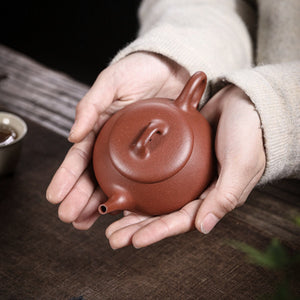 宜興紫砂壺紅降坡泥逸瓢壺130CC手持照
