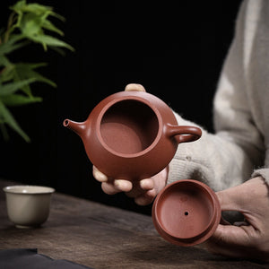 宜興紫砂壺紅降坡泥逸瓢壺130CC手持照